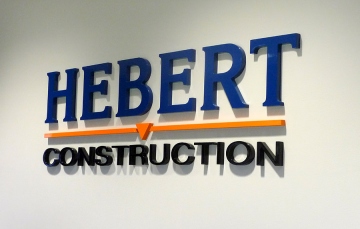1/2" cut out, custom painted PVC letters on office wall
