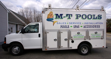 Vinyl lettering and printed logo on utility truck
