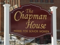 carved sign for Chapman House in Auburn, Maine