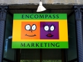 painted sign for Encompass Marketing of Auburn, Maine